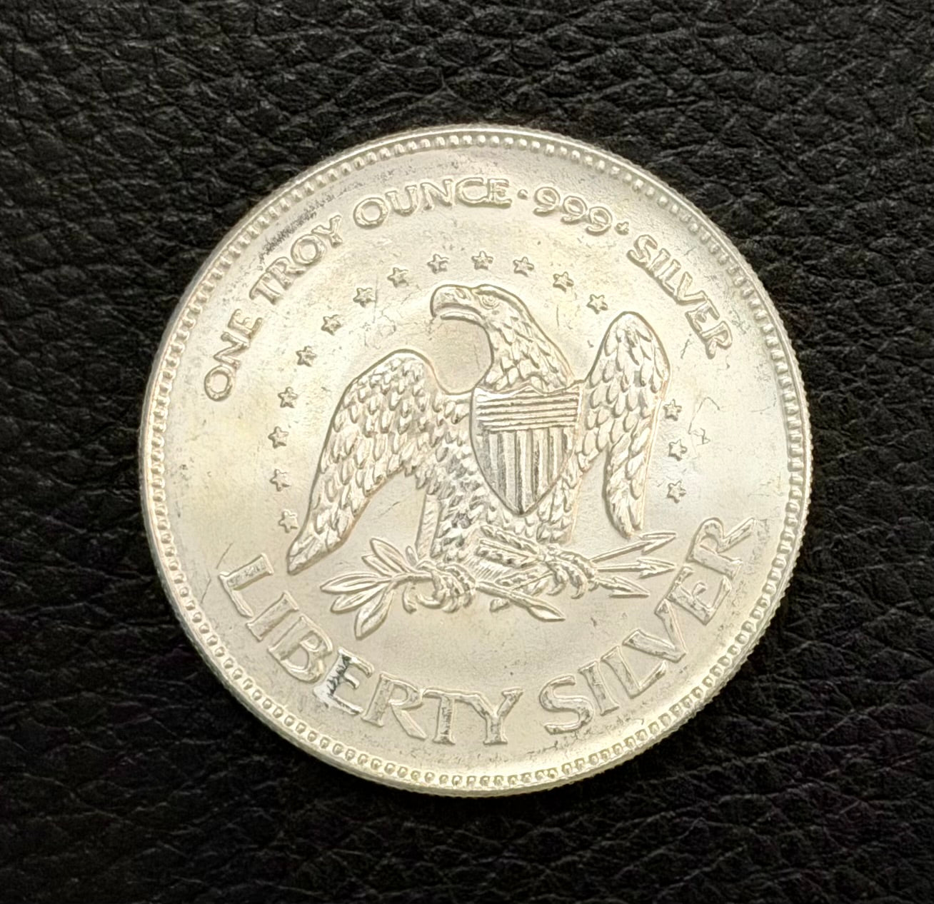1 ozt - vintage - a-mark liberty bell & eagle - .999 fine silver round