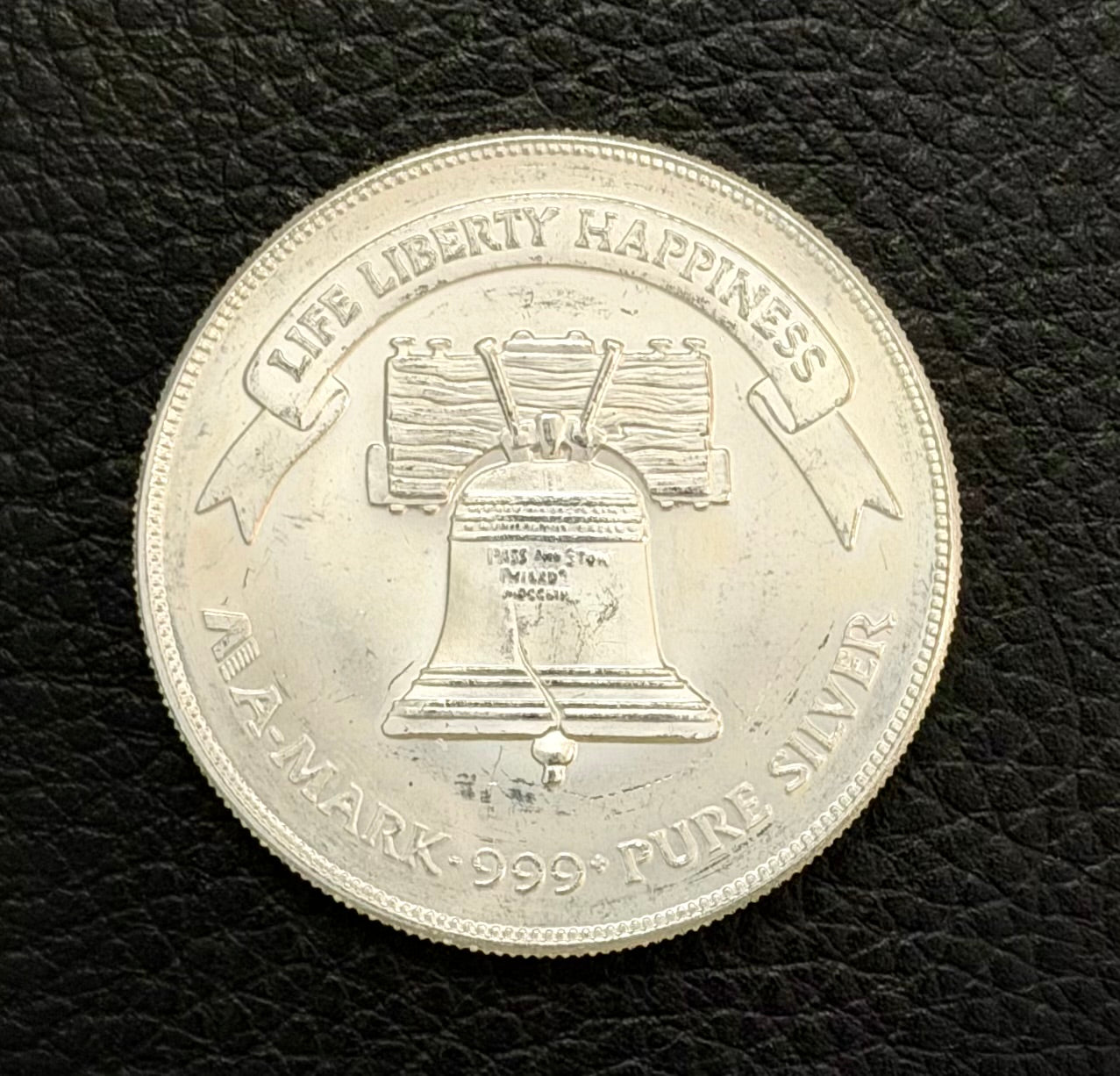 1 ozt - vintage - a-mark liberty bell & eagle - .999 fine silver round