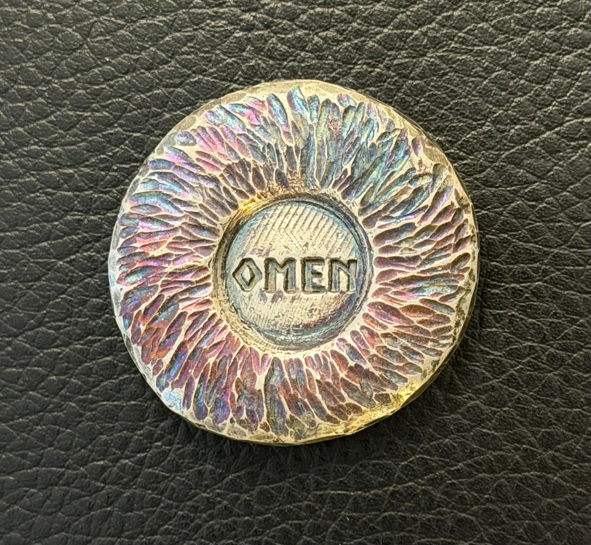 Omen - 52 Gram Fireworks Toned Round. .999 Fine Silver
